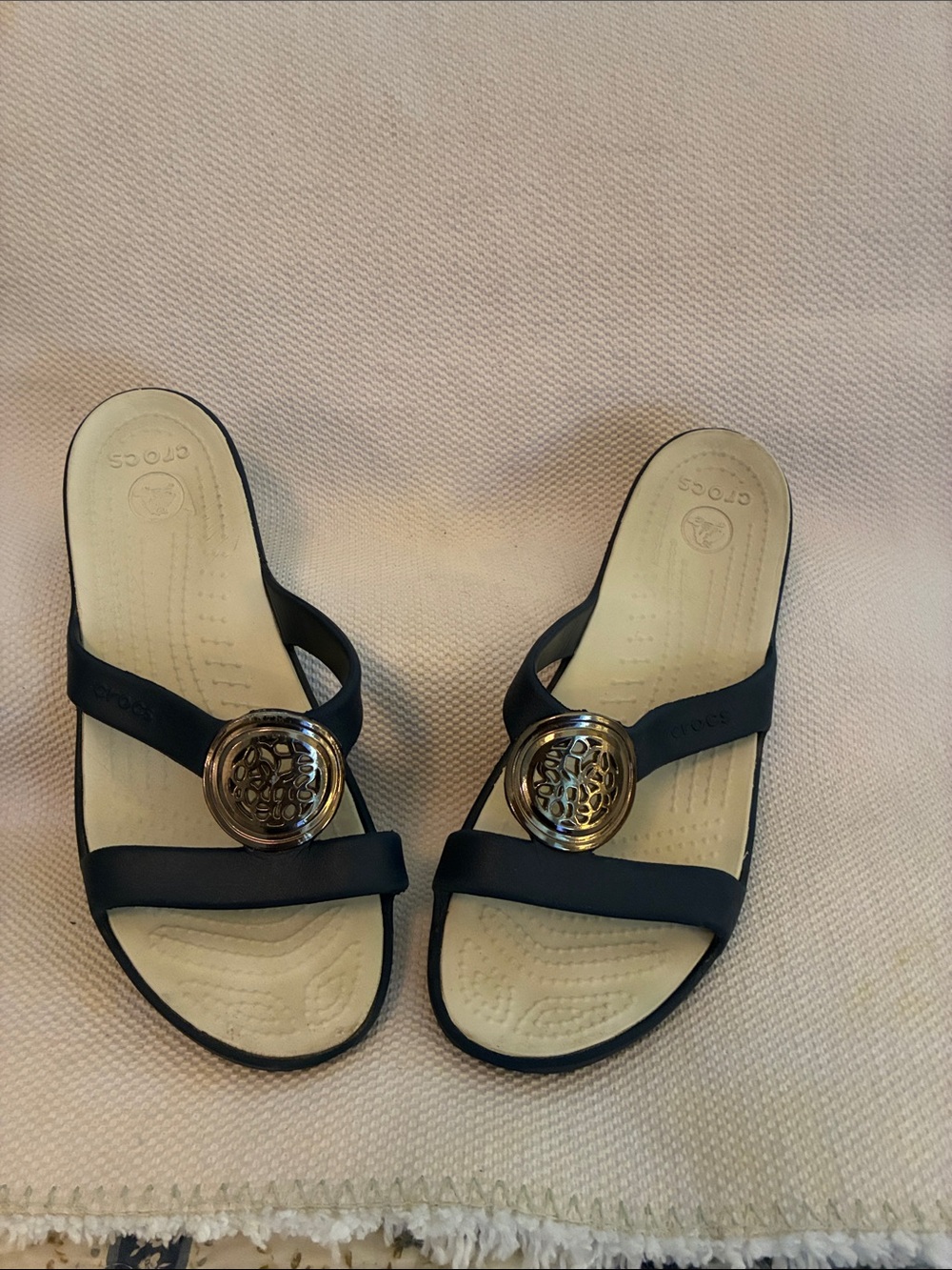 CROCS Women's Navy Slide Sandals with Gold Medallion